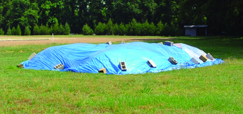 Tarped manure stockpile.jpg